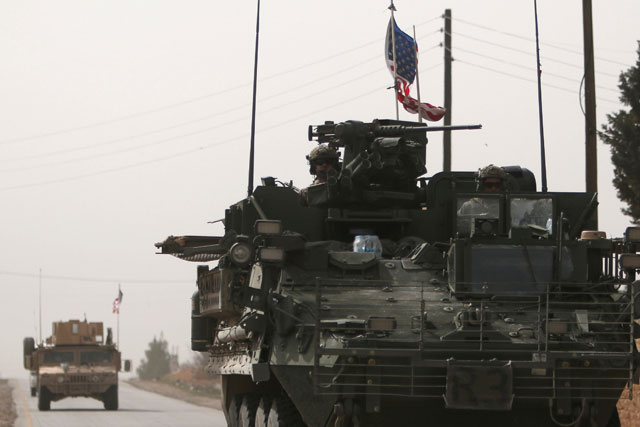 American army vehicles drive north of Manbij city in Aleppo Governorate, Syria, March 9 (Reuters photo)