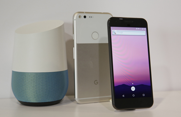 The new Google Pixel phone is displayed next to a Google Home smart speaker (left) following a product event, on Tuesday, in San Francisco (AP photo by Eric Risberg)