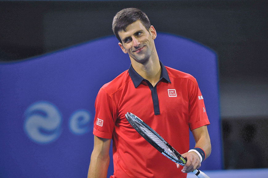 Novak Djokovic of Serbia smiles after winning a point against Rafael Nadal of Spain during their men’s singles final at the China Open tennis tournament in Beijing on Sunday (AFP photo by Wang Zhao)
