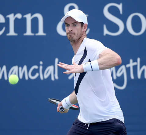 Andy Murray of Great Britain returns a shot to Frances Tiafoe during the Western & Southern Open in New York City, on Saturday (AFP photo by Matthew Stockman)