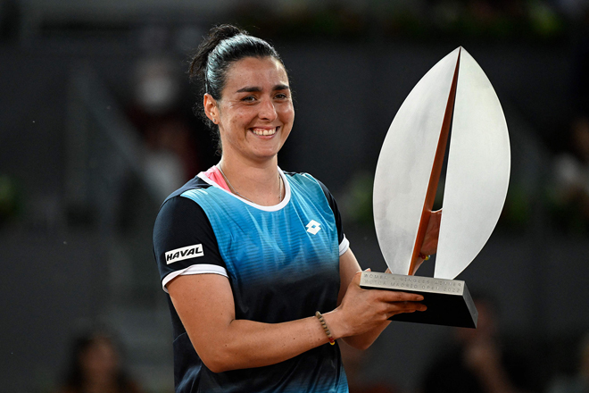 Tunisia’s Ons Jabeur celebrates winning the women’s singles final match of the 2022 WTA Tour Madrid Open by beating the US’ Jessica Pegula in Madrid on Saturday  (AFP photo by Pierre-Philippe Marcou)