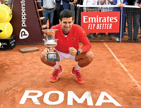 Serbia’s Novak Djokovic celebrates after winning the final match of the Men’s ATP Rome Open tournament against Greece’s Stefanos Tsitsipas in Rome on Sunday (AFP photo by Andreas Solaro)