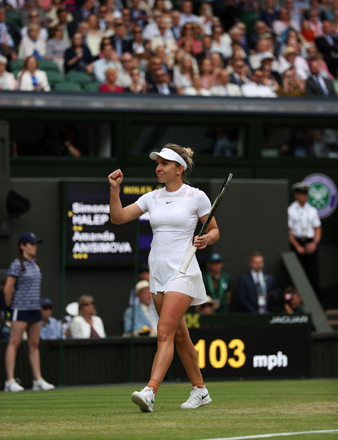 Romania’s Simona Halep celebrates winning against US player Amanda Anisimova during their women’s singles quarter final match at the 2022 Wimbledon Championships in London on Wednesday   (AFP photo by Adrian Dennis)