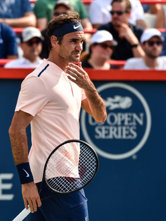 Roger Federer of Switzerland looks on against Roberto Bautista Agut of Spain (not seen) during day eight of the Rogers Cup in Montreal, Quebec, Canada,  on Friday  (AFP photo by Minas Panagiotakis)