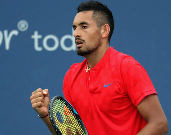 Nick Kyrgios of Australia pumps his fist after a winning shot to Rafael Nadal of Spain at the Cincinnati Open in Mason, Ohio, on Friday  (AFP photo by Matthew Stockman)