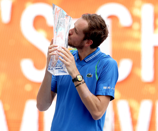 Russia’s Daniil Medvedev poses with the Butch Buchholz Trophy after beating taly’s Jannik Sinner at the Miami Open in Miami Gardens, Florida, on Sunday (AFP photo by Matthew Stockman)