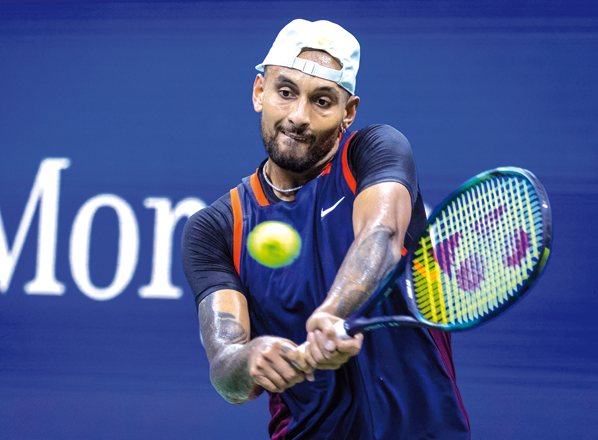 Australia’s Nick Kyrgios hits a return to Russia’s Daniil Medvedev during their 2022 US Open men’s match in New York on Sunday  (AFP photo by Corey Sipkin)