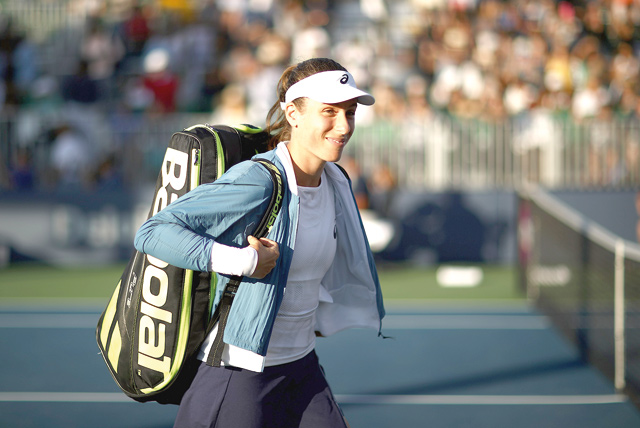 Johanna Konta of Great Britain walks on to the court for her match against Serena Williams of the United States during Day 2 of the Mubadala Silicon Valley Classic at Spartan Tennis Complex on Tuesday in San Jose, California  (AFP photo by Ezra Shaw)