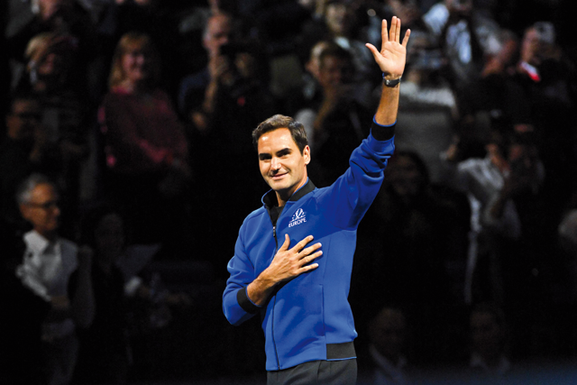 Switzerland’s Roger Federer acknowledges the applause as he walks onto court ahead of the evening’s matches in the 2022 Laver Cup in London on Friday (AFP photo by Glyn Kirk)
