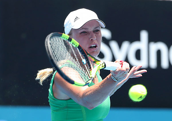 Denmark’s Caroline Wozniacki hits a return against Czech Republic’s Barbora Strycova in their women’s quarter-final match at the Sydney International in Sydney on Wednesday  (AFP photo by Glenn Nicholls)