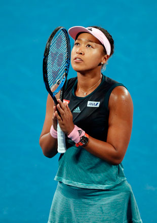 Japan’s Naomi Osaka celebrates after beating the Czech Republic’s Karolina Pliskova at the Australian Open in Melbourne on Thursday (AFP photo by David Gray)