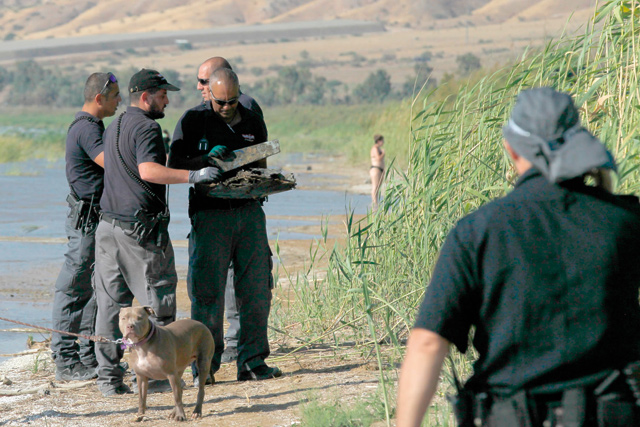 Israeli forces search the Sea of Galilee coasts for the remains of a reported drone launched from Syria and intercepted by a Patriot missile on Wednesday, near the Ha-On kibbutz, northeastern Israel (AFP photo)