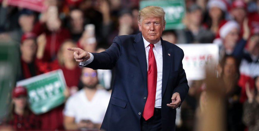 President Donald Trump leaves his Merry Christmas Rally at the Kellogg Arena on Wednesday in Battle Creek, Michigan (AFP photo)