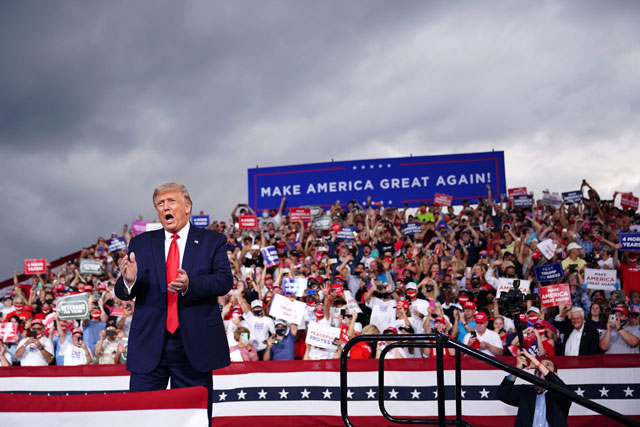 US President Donald Trump arrives for a campaign rally at Smith-Reynolds Regional Airport in Winston-Salem, North Carolina, on Tuesday (AFP photo)