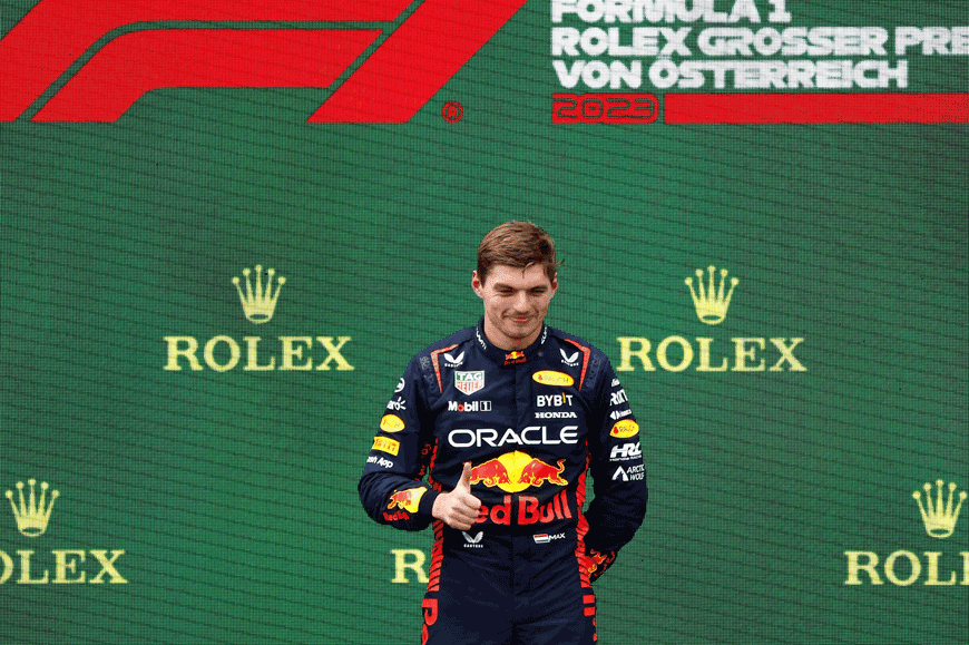 Winner Red Bull Racing’s Dutch driver Max Verstappen celebrates on the podium after the Formula One Austrian Grand Prix at the Red Bull racetrack in Spielberg, Austria, on Sunday (AFP photo by Erwin Scheriau)