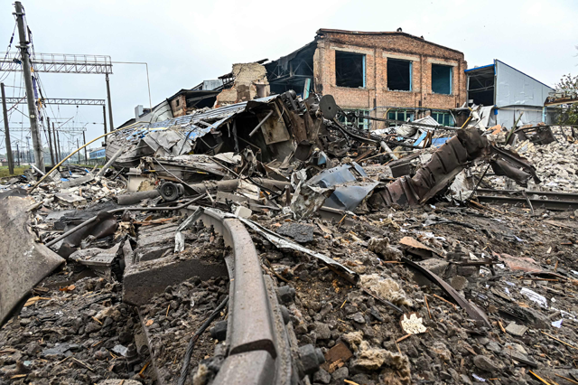 This photo taken on Wednesday shows rubble at a railway yard of the freight railway station in Kharkiv, which was partially destroyed by a missile strike, amid the Russian invasion of Ukraine (AFP photo)