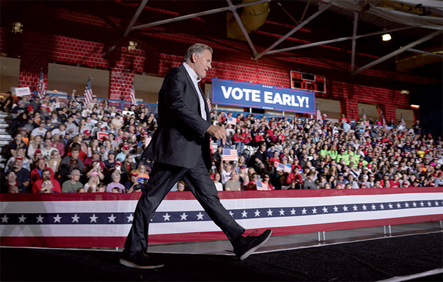 Michigan GOP candidate for the US Senate Mike Rogers arrives to speak at a campaign event hosted by Republican presidential nominee former President Donald Trump at Saginaw Valley State University on Thursday in Saginaw, Michigan (AFP photo)