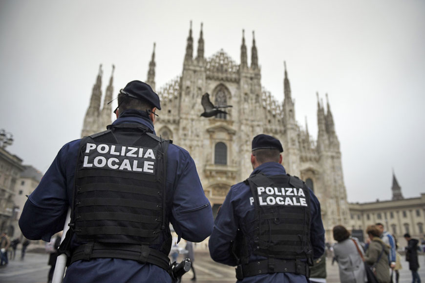 Italian policemen patrol at Piazza del Duomo (Milan’s cathedral) on Thursday in Milan (AFP photo)