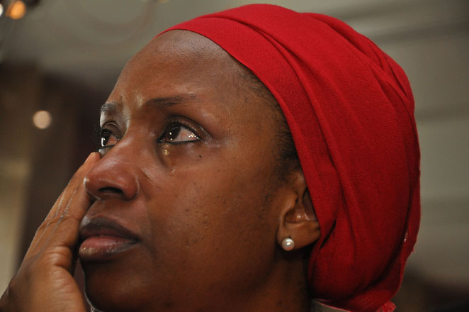 An unidentified mother of a child that was abducted by Nigerian extremists reacts during an event in the memory of the girls and forming part of the 'Bring Back Our Girls' campaign at the presidential residence in Abuja on Wednesday (AP photo)