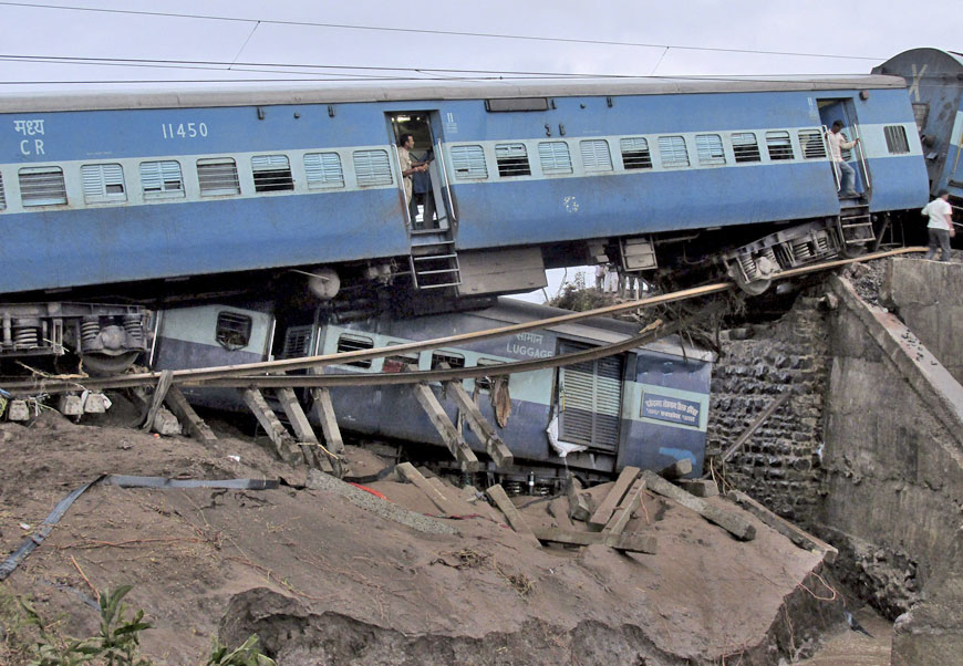 Damaged coaches of passenger trains are pictured after they derailed near Harda in Madhya Pradesh, India, on Wednesday (Reuters photo)