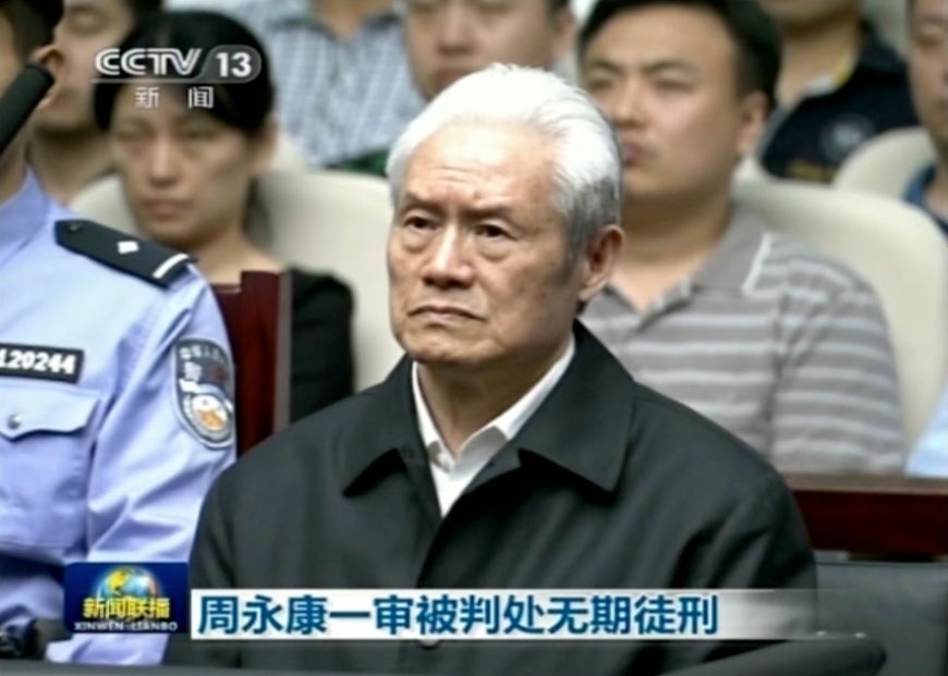 In this image taken from video released by China’s CCTV, Zhou Yongkang, formerly the Chinese Communist Party’s politburo standing committee member in charge of security, sits in a courtroom at the First Intermediate People’s Court of Tianjin in Tianjin, China, Thursday (AP photo/CCTV)