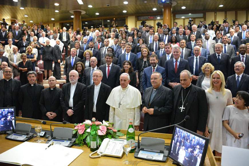 This handout picture released by the Pontifical Academy of Sciences shows Pope Francis (centre) posing for a family photo during an international summit of Mayors on ‘Modern Slavery and Climate Change’ at the Vatican on Tuesday (AFP photo/Pontifical Academy of Sciences)