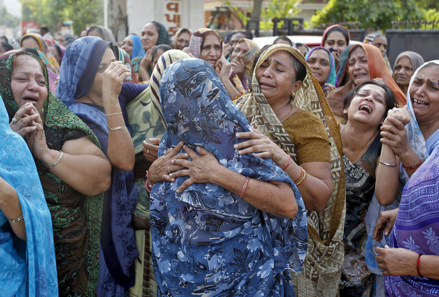 Relatives mourn during the funeral procession of Shantilal Boghra and his sister Bhanu Doberaiya, who died in a blast in central Madhya Pradesh state on Saturday in Ahmedabad, India (Reuters photo)