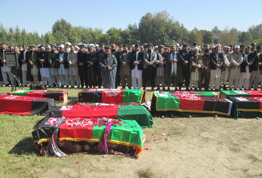 Afghan men offer funeral prayers in front of the bodies of people killed in an earthquake in Takhar province, northeast of Kabul, Afghanistan, Tuesday (AP photo)