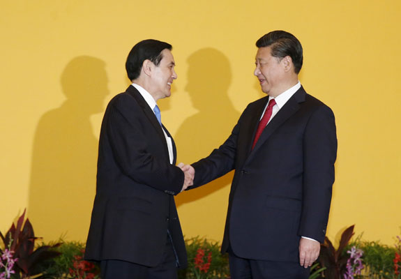China’s President Xi Jinping (right) shakes hands with Taiwan’s President Ma Ying-jeou during a summit in Singapore on Saturday (Reuters photo)
