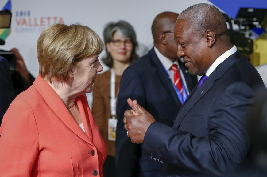 German Chancellor Angela Merkel (left) talks with Ghana’s President John Dramani Mahama during the Valletta Summit on Migration in Valletta, Malta, on Thursday (Reuters photo)
