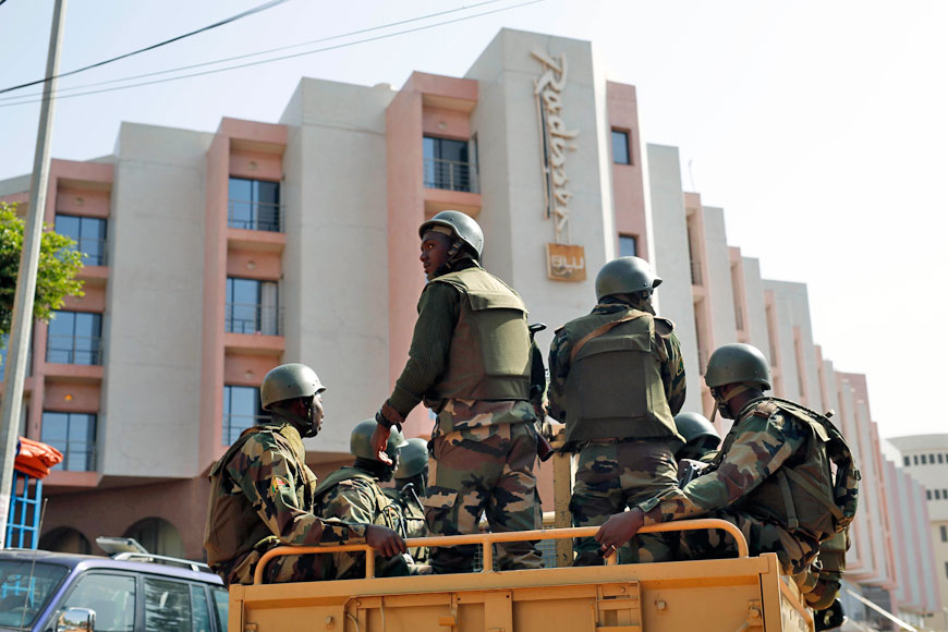 Soldiers from the presidential patrol outside the Radisson Blu Hotel in Bamako, Mali, Saturday (AP photo)