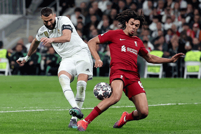 Real Madrid’s French forward Karim Benzema (left) vies with Liverpool’s English defender Trent Alexander-Arnold during their UEFA Champions League last 16 second leg match in Madrid on Wednesday  (AFP photo by Pierre-Philippe Marcou)