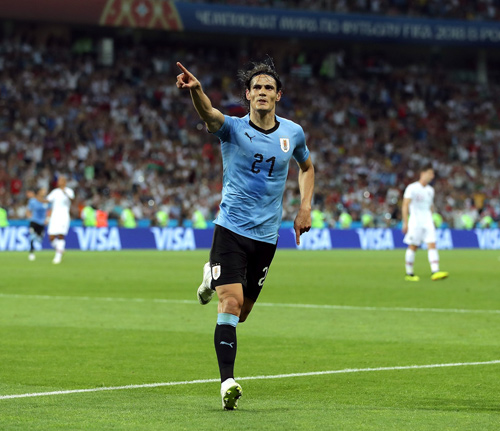 Edinson Cavani celebrates after scoring against Portugal during their 2018 World Cup match on June 30  (AFP photo)