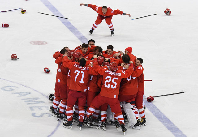 The Olympic Athletes from Russia celebrate winning the men’s gold medal ice hockey match against Germany during the Pyeongchang 2018 Winter Olympic Games in Gangneung on Sunday (AFP photo by Kirill Kudryavtsev)