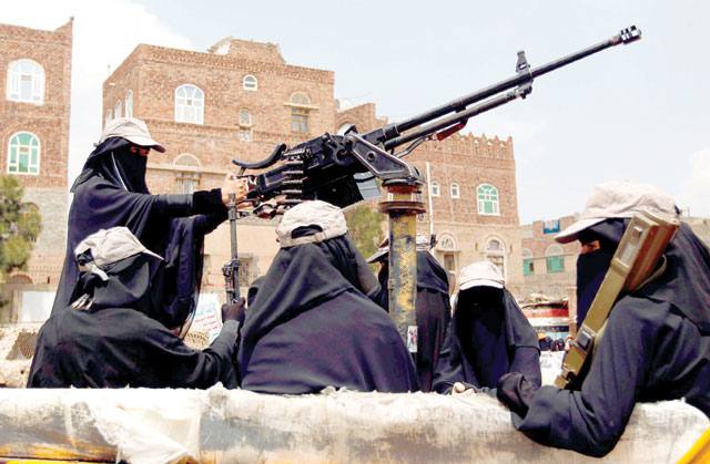 In this file photo taken on September 06, 2016, Yemeni female fighters supporting the Shiite Houthi rebels holds weapons as they take part in an anti-Saudi rally in the capital Sanaa (AFP photo)
